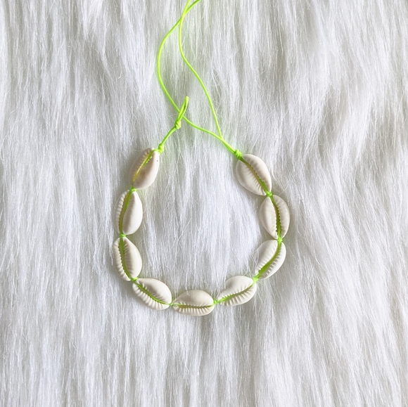Jewelry - White cowrie shell and neon green handmade bracelet